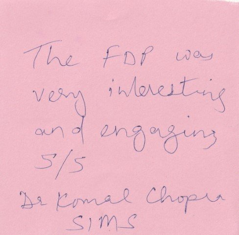 Handwritten validation card from Dr. Komal Chopra
